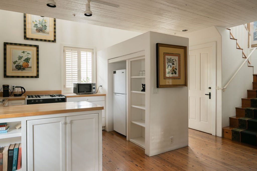 The sitting room and wood-burning fireplace of Pendle Cottage